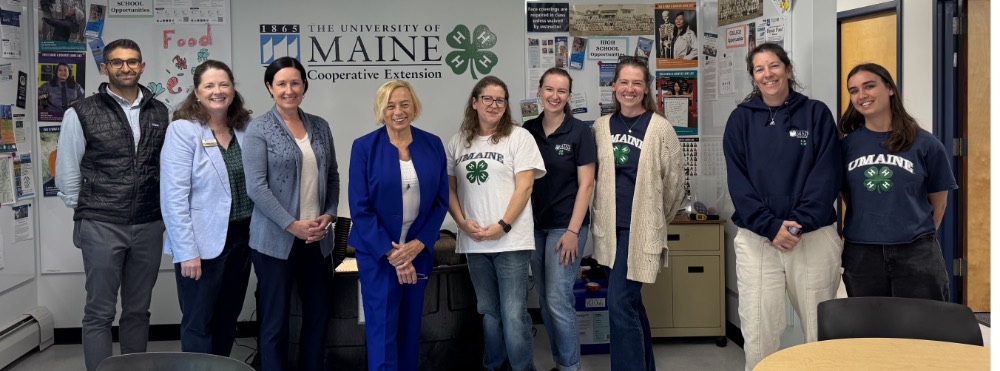 Governor Mills with a group of people at Lafayette and Rawcliffe 4-H Science and Engineering Center