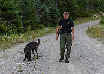 Warden with dog