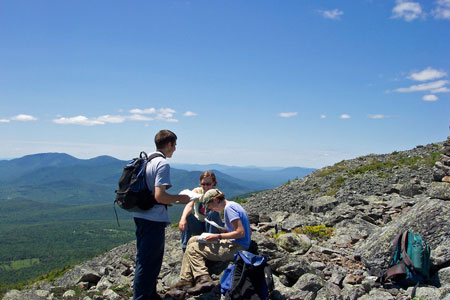 Photo: Ecologists at summit of Mt. Abraham, showing view beyond