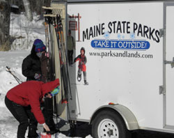 Maine State Parks ski and snowshoe trailer at an winter event.