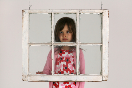 child near window with lead paint