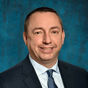 Commissioner Mike Sauschuck