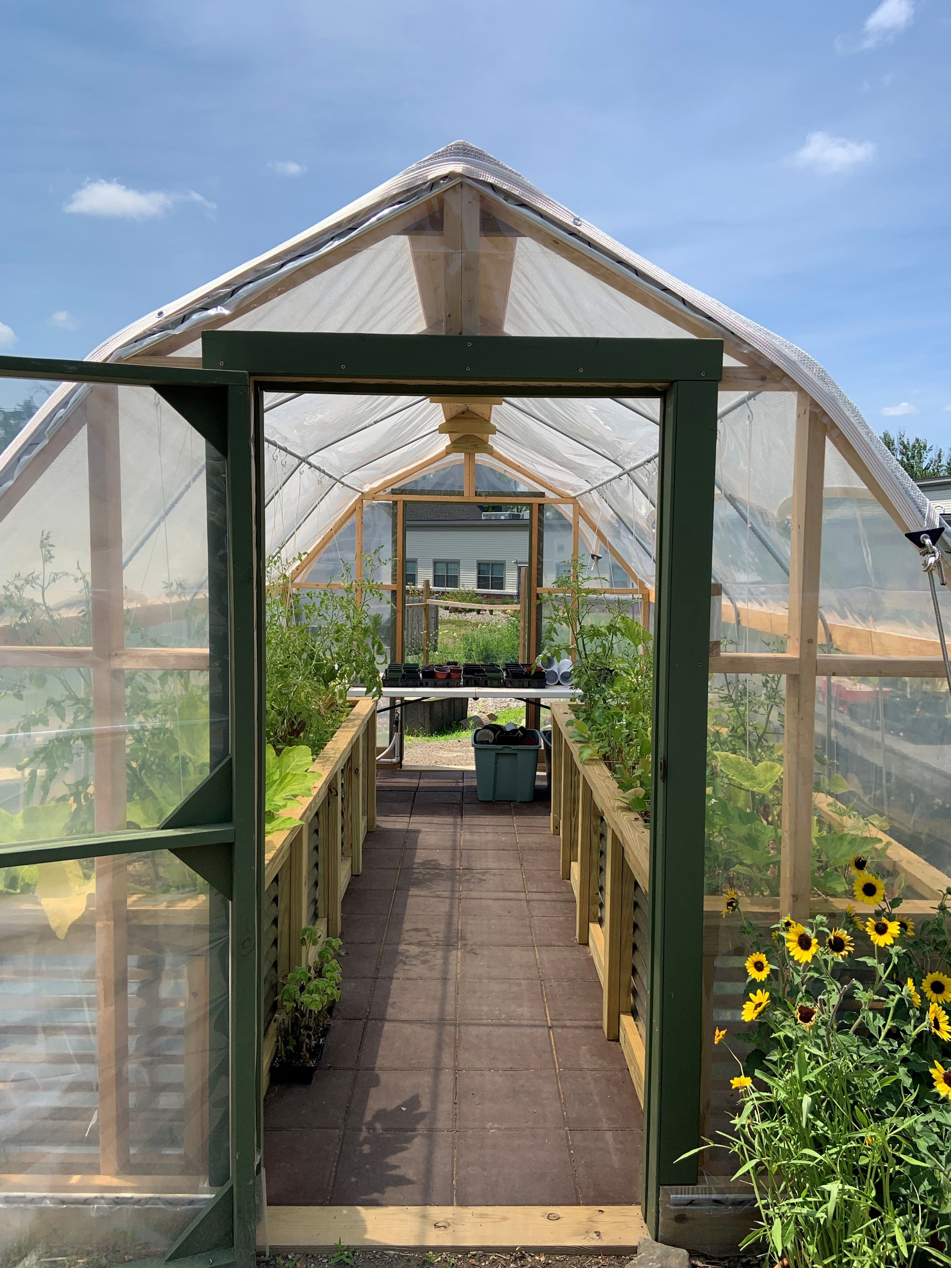 The entrance of a greenhouse.